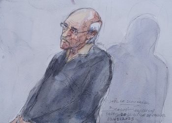 French doctor accused of sexually abusing hundreds of children is sentenced to 20 years