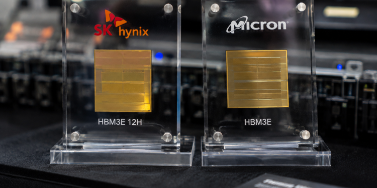 SK Hynix and Micron HBM3E memory chips displayed side by side at a technology showcase.