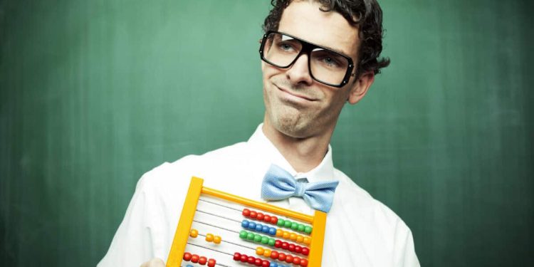 man in bowtie poses with abacus