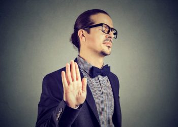 man gives stopping gesture