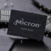 Micron DDR5 8200 memory chip displayed among semiconductor components.