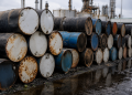 Oil prices extend a two-day slide as US-Iran diplomacy cuts the war premium, while Hormuz shipping flows remain constrained today.