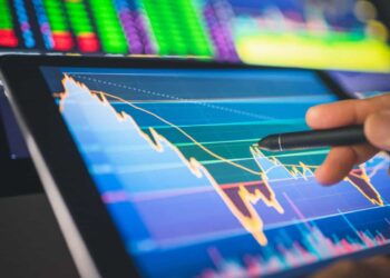 investor looks at volatility chart