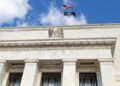 Dollar Soars as Fed Hikes Rates and Signals More to Come
