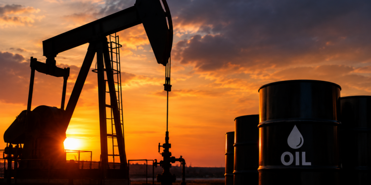 Sunset Pumpjack and Oil Barrels