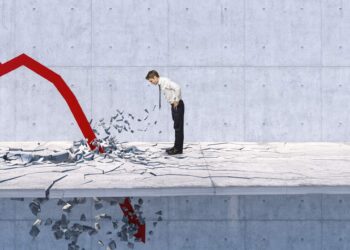 a person watches a downward arrow crash through the floor
