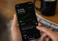 A person using Robinhood app on phone
